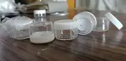 100pcs 5g plastic jars empty cosmetic container clear body white cap clearance