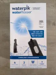 NEW Waterpik Cordless Express Portable Water Flosser Oral Irrigator Black 4 Tips