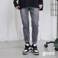 在飛比找momo購物網優惠-【gozo】gozo圓標抽鬚修身牛仔褲(兩色)