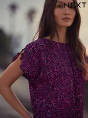Pink Animal Print Flutter Sleeve Textured Smart Top (E54567) | $41