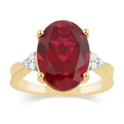 Bevilles Oval Shaped Created Ruby Ring with 0.10ct of Diamonds in 9kt Yellow Gold