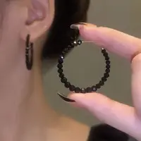 在飛比找momo購物網優惠-【Emi 艾迷】時尚個性黑色水晶圈圈925銀針耳環