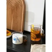 在飛比找ETMall東森購物網優惠-耐高溫設計師玻璃杯 把手牛奶杯可微波咖啡杯耐熱 早餐水杯茶杯