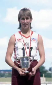 Australia Olympic champion heptathlete Glynis Nunn with a trophy - Old Photo