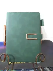 GREEN A5 NOTEBOOK WITH MAGNETIC CLOSURE AND PEN HOLDER