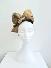 Miss Samantha. Womens loop headband fascinator in Taupe