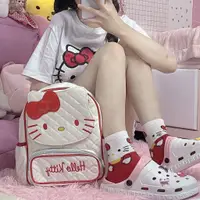 在飛比找蝦皮購物優惠-hello kitty 雙肩包pu皮亮面可愛旅行包書包萌妹童