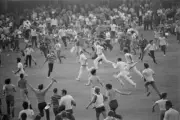 Fans invading the cricket ground to celebrate after Lancashire won - Old Photo