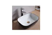 White and black above counter basin
