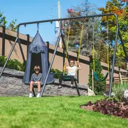 TitanPro Swing Set with Saucer Tent Swing - Trampoline Games | Springfree® Trampoline