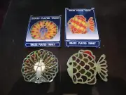 2-NEW IN BOX VTG. KMART 5+'' BRASS PLATED TRIVETS,1-FISH & PEACOCK,RUBBER FEETS