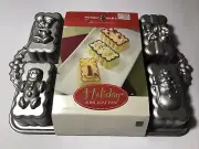Nordic Ware USA Holiday Mini Loaf Bundt Pan Heavy Cast Aluminum Christmas