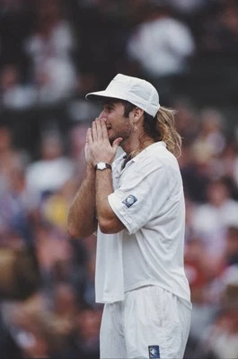 American tennis player Andre Agassi holding his hands to his face - Old Photo
