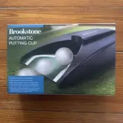 NEW Brookstone Automatic Putting Cup Cordless Portable Heavy Plastic