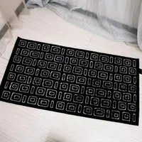在飛比找momo購物網優惠-【山德力】ESPRIT羊毛回紋地毯70X140黑色(厚實羊毛