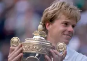 Stefan Edberg of Sweden poses with the trophy after defeating Bor - Old Photo