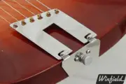 Left-handed R to trapeze tailpiece conversion kit made for Rickenbacker guitars