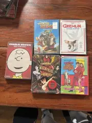DVDs over the hedge, gremlins, Austin Powers, Moulin Rouge, Charlie Brown