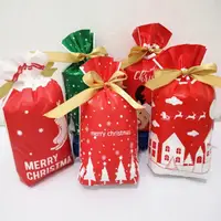 在飛比找momo購物網優惠-【KStore】聖誕歐式絲帶抽繩禮品包裝袋 50入組(聖誕禮