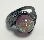 Halloween Skeleton Hands Holding a Crystal Ball Ring Charcoal Pink Glitter Bead