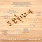 Benchmade 535 BUGOUT 20pc Titanium Screw Set, Pivot, Standoff, Pin, T.Stud BRASS