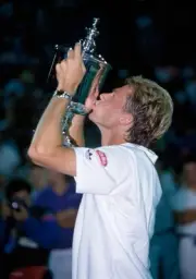 Stefan Edberg of Sweden kissing the trophy after defeating Pete Sa- Old Photo
