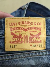 在飛比找Yahoo!奇摩拍賣優惠-Levi's 513 日本製造 破壞縫補小直筒牛仔褲 33 