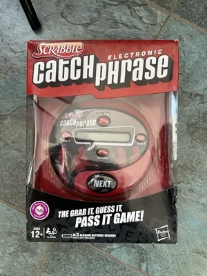 Hasbro Scrabble Electronic Catch Phrase Handheld Electronic Game New/Sealed