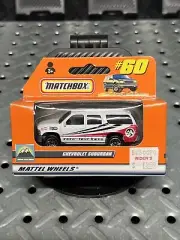 1999 MATCHBOX SUPERFAST #60 CHEVROLET SUBURBAN ZERO TEST BASE NIP