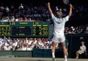 Stefan Edberg of Sweden celebrates as he defeats Boris Becker of W- Old Photo