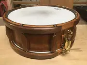 5 1/2 x14 Custom made snare drum. Cherry Stave shell. Walnut Lugs.