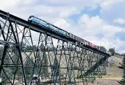 Great Northern Sky Blue F45 and SD45’s on a high trestle LARGE Postcard - MINT!