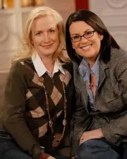 Actress Angela Kinsey poses with host Megan Mullally on October 27- Old Photo 1