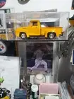 1956 Ford Stepside Truck Orange 1/18 Scale With 1/18 Scale Display Case With Gla