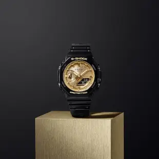 【CASIO 卡西歐】G-SHOCK 八角農家橡樹雙顯手錶-時尚黑金 母親節 禮物(GA-2100GB-1A)