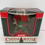 Coca-Cola 1998 Contour Bottle Collection Bottle With Earmuffs Red Green Scarf