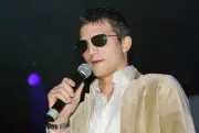 Actor Ashton Kutcher speaks at the launch of the uBid for Hurrican - Old Photo 1