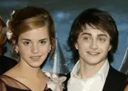 Daniel Radcliffe and Emma Watson attend the UK Premiere of Harry - 2004 Photo 6
