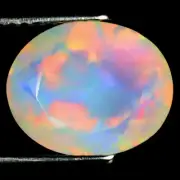 2.77 ct Remarkable Oval (12 x 9 mm) Flashing 360 Degree Multicolor Rainbow Opal