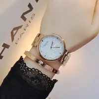 在飛比找ETMall東森購物網優惠-士手表滿水鉆玫瑰合金表帶個性潮流女時尚圓形石英白色面國產腕表
