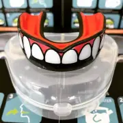 Oral Mart MMA Boxing BJJ Karate Football Mouth Guard (Vampire Fangs, Strapless)