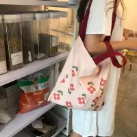 在飛比找樂天市場購物網優惠-包包 女帆布包 女學生韓版單肩包 泫雅同款花朵百搭側包【不二