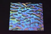 1101.24 - 4"x 4" IRIDIZED CLEAR SOFT RIPPLE TEXTURED BULLSEYE GLASS 90 COE