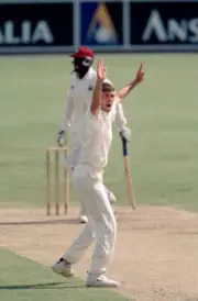 Glenn McGrath of Australia in action against the West Indies - Old Cricket Photo