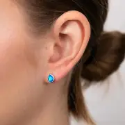 Sterling Silver Pear Shaped Created Blue Topaz Stud Earrings