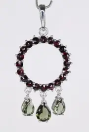 Faceted MOLDAVITE Pear Cut with Garnet Sterling Silver Pendant with COA