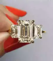3 Ct Emerald Cut Lab-Created Diamond Three-Stone Ring 14k Yellow Gold Plated