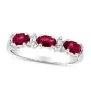 Sideways Oval Ruby and 0.10 CT. T.W. Natural Diamond Three Stone Ring in Solid 14K White Gold