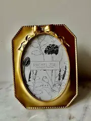 New Gold Ornate bow on top Picture Frame Opening oval for 5”x7” Photo..
