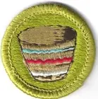 BSA BASKETRY LIGHT BROWN MERIT BADGE CURRENT DESIGN TYPE H PLASTIC BACK #2a GRN